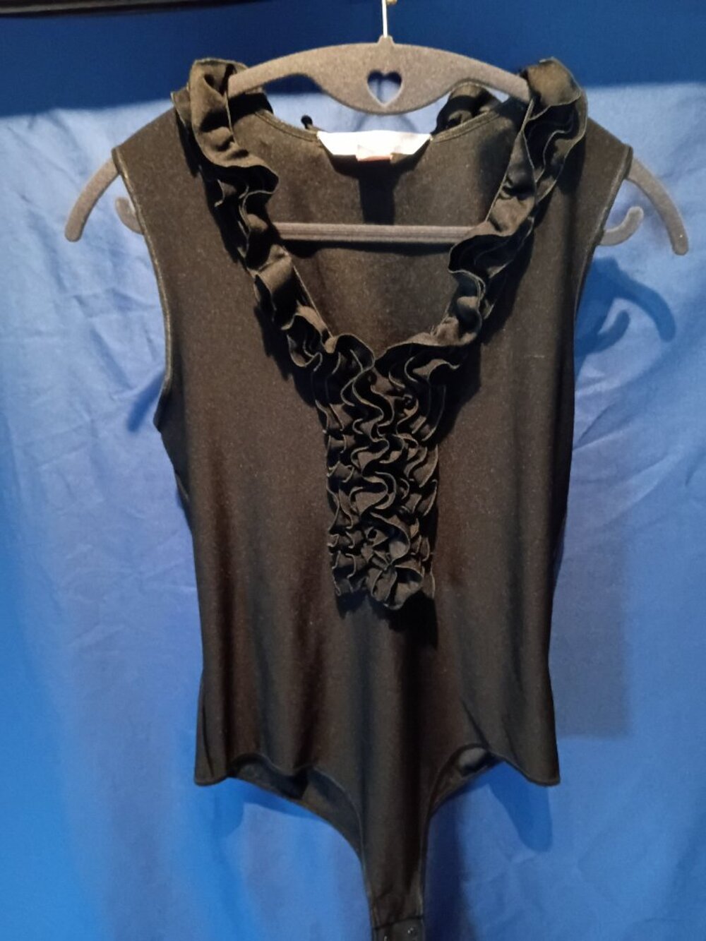 Gently worn black Victoria's Secret ruffle body suit large